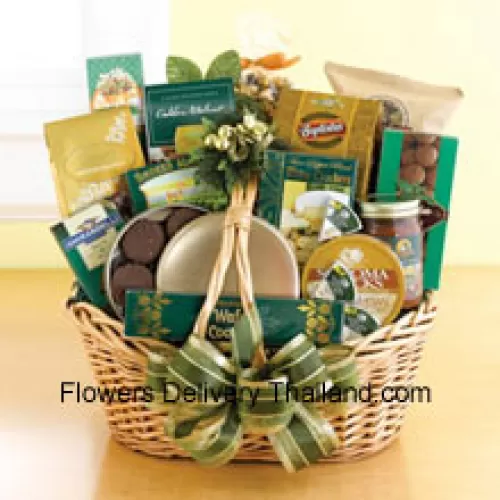 Start a tradition of sending good taste to your mom this year. Our classic wicker basket comes piled high with a gourmet assortment that is sure to please your mom. We accent the basket with green and gold ribbon and accents to make a great impression. Inside, your mom will discover an assortment that features something for everyone: Lindt chocolate truffles, smoked almonds, walnut cookies, chocolate cookies, chocolate-covered popcorn, cheese, crackers, a Ghirardelli chocolate bar, tortilla chips, salsa, chocolate wafer cookies , cheese swirls, and chocolate-covered sandwich cookies. (Please Note That We Reserve The Right To Substitute Any Product With A Suitable Product Of Equal Value In Case Of Non-Availability Of A Certain Product)