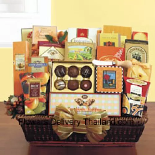 Our Thanks Giving Gift Basket is perfect when you need to send a large gift and insure there is plenty of variety for her to enjoy. Our wicker tray basket is brimming with gourmet goodies that she will appreciate, like California smoked almonds, Lindt truffles, a Ghirardelli caramel chocolate bar, Dolcetto wafer cookies, dried fruit, cashew crunch, cheese straws, carrot cake cookies, breadsticks, cheese, a cheese knife, crackers, English toffee, cookies, English tea cookies, toffee pretzels, toffee almonds, LeGrand truffles, and cappuccino mix. (Please Note That We Reserve The Right To Substitute Any Product With A Suitable Product Of Equal Value In Case Of Non-Availability Of A Certain Product)